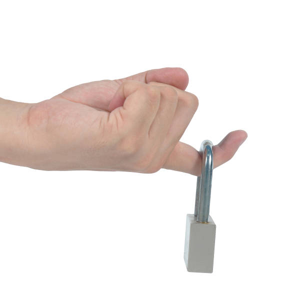 istock Man forefinger locked by padlock, Trigger-Finger health care bus 640056580