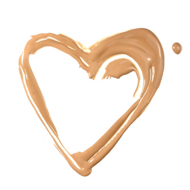 istock Splash of heart-shaped makeup base on white 640057068