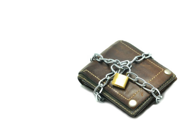 istock Leather wallet locked for saving, business concept. 640057234