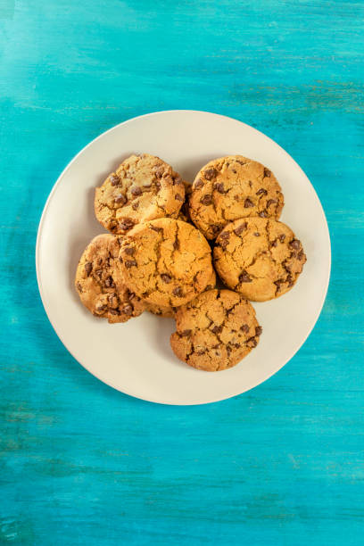 istock Plate of chocolate chips cookies with place for text 640057278