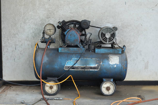 istock Dirty Mini electric pump next to grunge wall 640060282