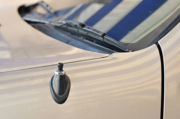 istock Manual car radio antenna extended with pick-up under blue 640061738