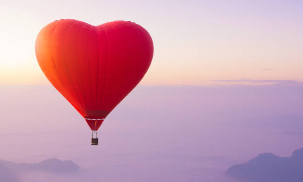istock valentine balloon in the sky 640063328