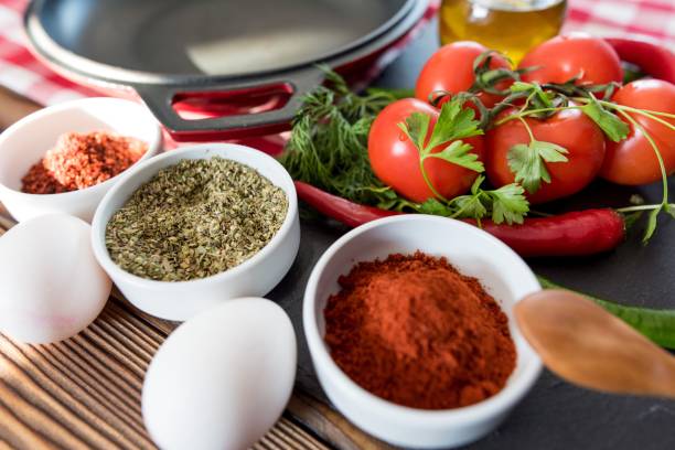 istock Frying Pan with Fresh Vegetables On Wooden Table 640063462