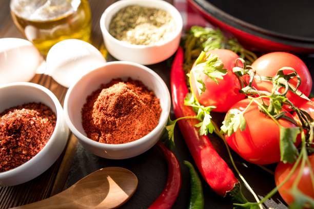 istock Frying Pan with Fresh Vegetables On Wooden Table 640063484