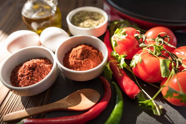 istock Frying Pan with Fresh Vegetables On Wooden Table 640063510