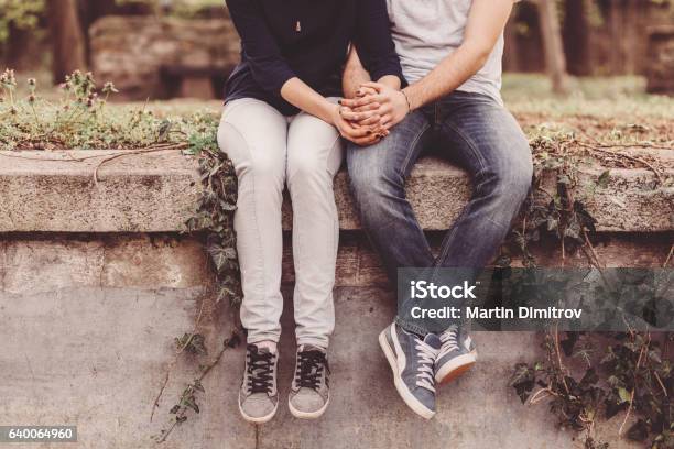 Loving Couple Holding Hands Stock Photo - Download Image Now - Teenager, Couple - Relationship, Love - Emotion