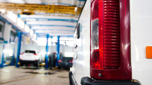 istock Automobile diagnostic service - mechanics working, defocused background 640069520