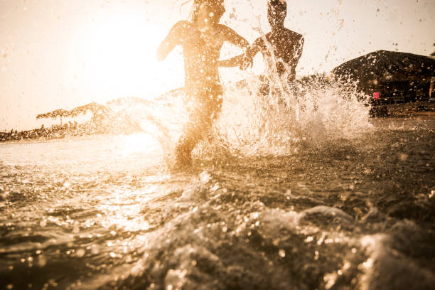 istock Chasing in the sea at sunset! 640071082