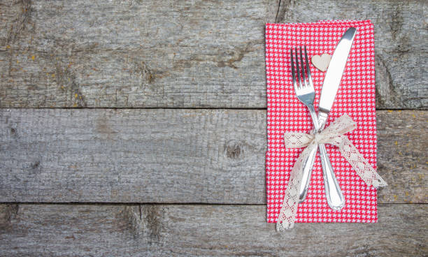 istock Cutlery on red checkered napkin. Romantic dinner for Valentines day 640072232