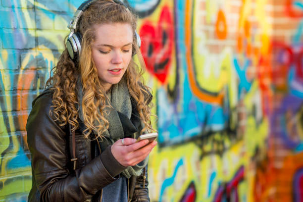 istock Listening to Music Downtown 640077378