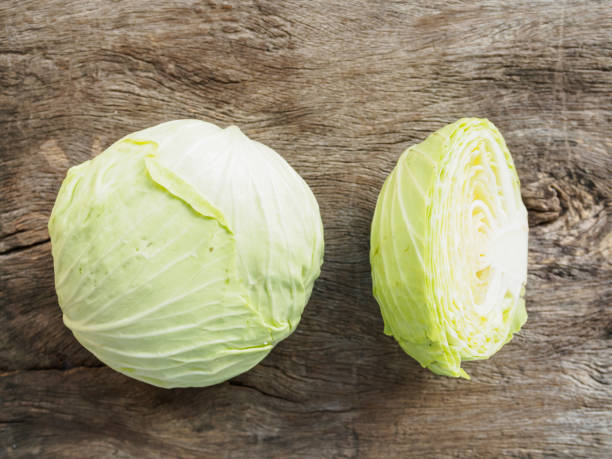 istock Top view of fresh cabbage vegetable on wooden table 640079312