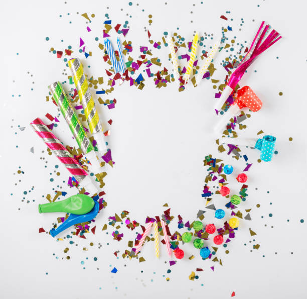istock Frame with confetti, balloons, noisemakers and decoration on whi 640081004