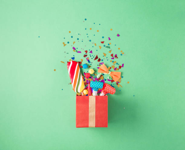 istock Gift box with party confetti, balloons, streamers, noisemakers, 640081158