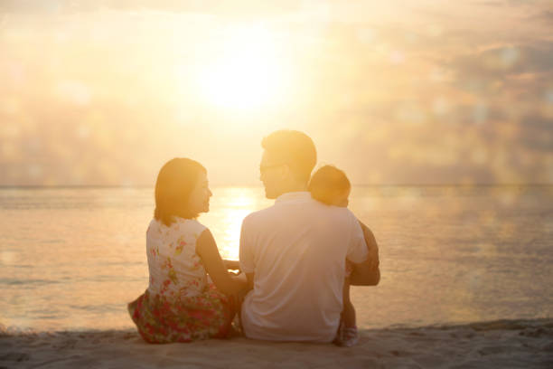 istock Family enjoying sunset view 640081408