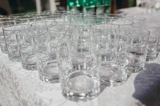 istock lot of empty glasses on a table outdoors 640081476