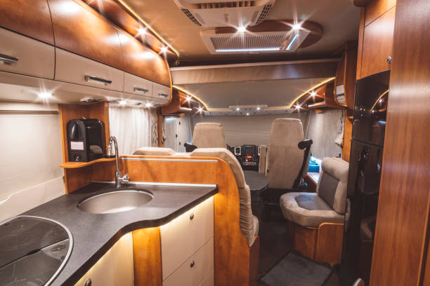 Modern motorhome on the inside Modern motorhome on the inside camping stove photos stock pictures, royalty-free photos & images
