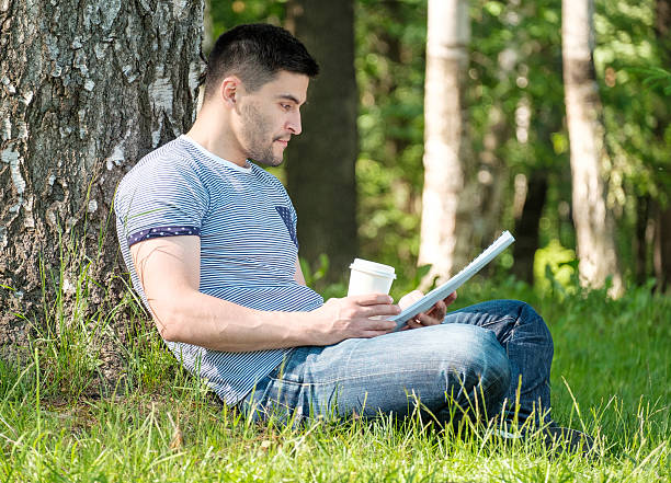 istock Young man in city park 640083626