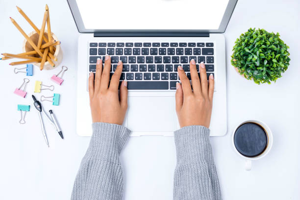 hand using laptop on white background - spiral notebook audio imagens e fotografias de stock