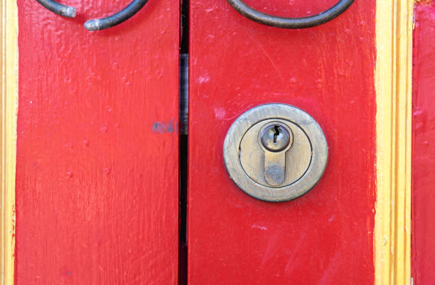 Lock on chinese red wooden decorated door for background.