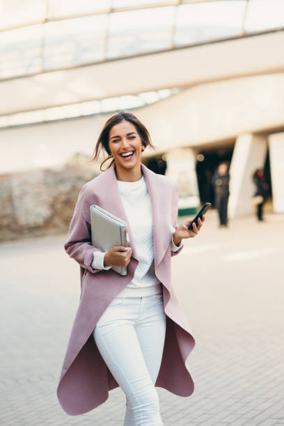istock Beautiful elegant woman texting on the phone 640086030