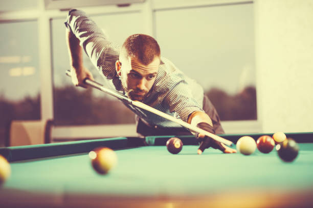 istock Vintage image of pool player in plaid shirt 640086778
