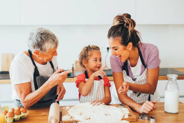 istock Family making cookies in the kitchen 640087114