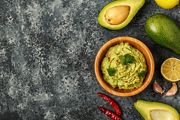 istock Homemade guacamole with ingredients. 640087522