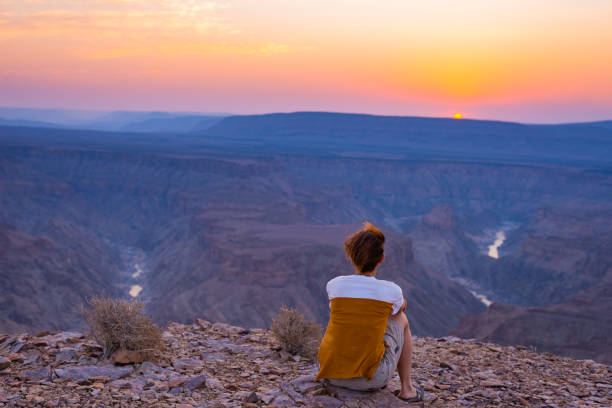istock Tourist at scenic Fish River Canyon, Namibia, Africa 640088224