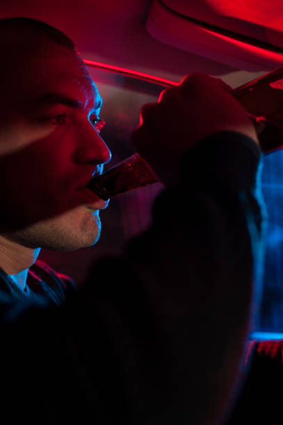 istock Male driver drinking beer in car 640091240