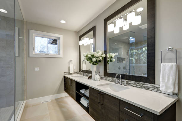 istock Spacious bathroom in gray tones wizth long vanity 640091780