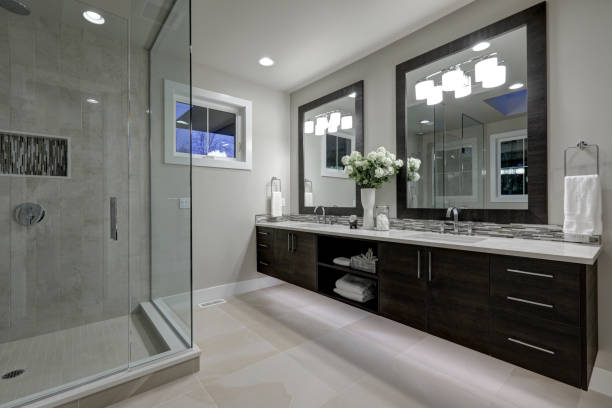 istock Amazing master bathroom with large glass walk-in shower 640092090