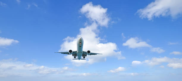 istock airplane landing over the sea 640092132