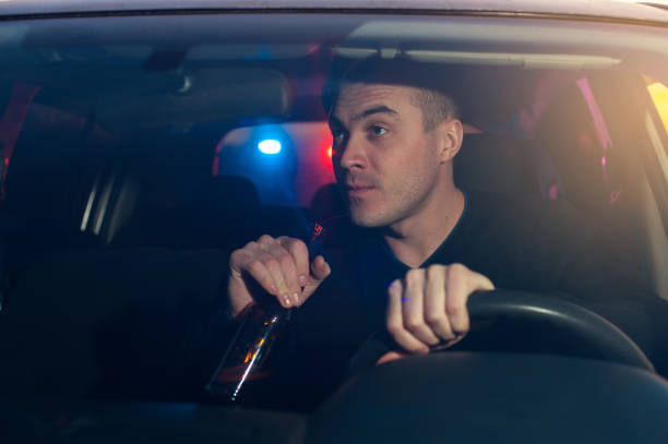 istock Drunk driver chased by police while driving car 640092382