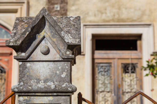 istock stone square decoration on pillar of fence 640094776