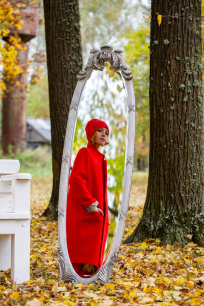 istock Girl in the autumn forest 640095880