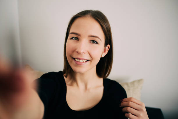 istock women taking selfie at home 640097540