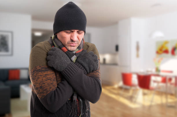 istock Portrait of sick man shivering from cold 640098550