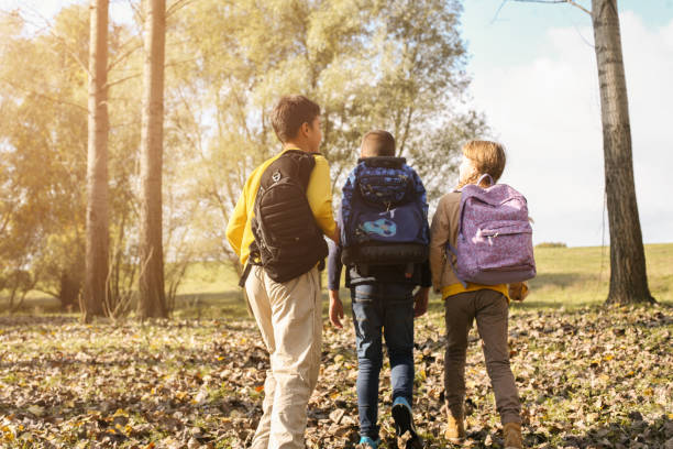istock Small group of  children returning from school. 640099712
