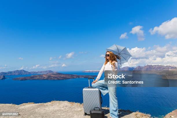 Young Woman With Suitcase Stock Photo - Download Image Now - Adult, Adults Only, Arrival
