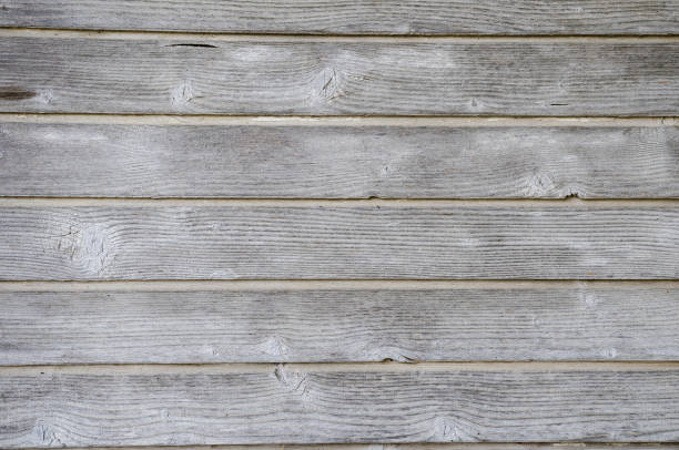 istock Grunge wood fence with knots 640101422