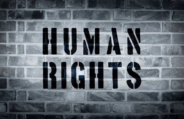 istock Human rights stencil print on the grunge white brick wall 640101440