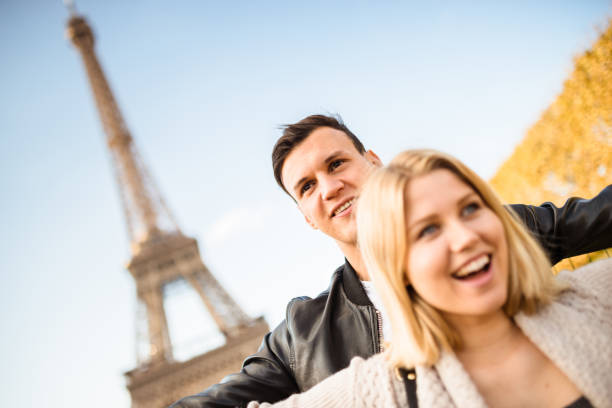 istock romantic couple enjoying the sunset on Paris 640101792