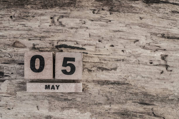 istock Cube calendar for may on wooden background 640103994
