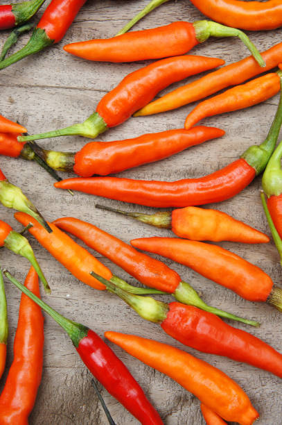 istock Red pepper on a wooden background 640104732