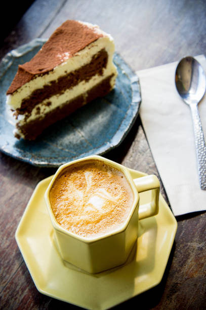 istock coffee cup and Chocolate cake in coffee shop 640105672