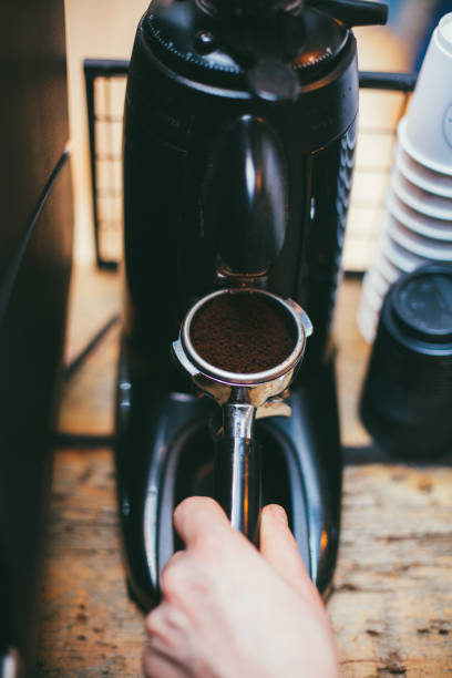 istock Coffee grinder grinds freshly roasted coffee beans 640106384