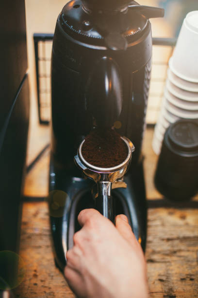 istock Coffee grinder grinds freshly roasted coffee beans 640106542