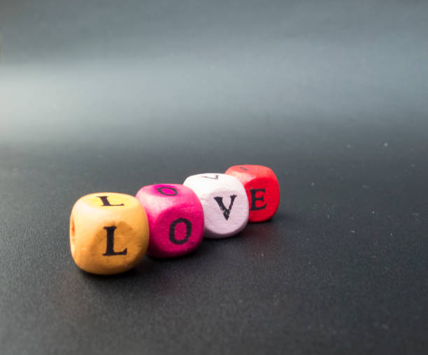 istock LOVE the black background colored letters 640106914