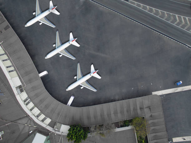 Aerial view of an airport Aerial view of an airport. This image is a composition. airport runway photos stock pictures, royalty-free photos & images